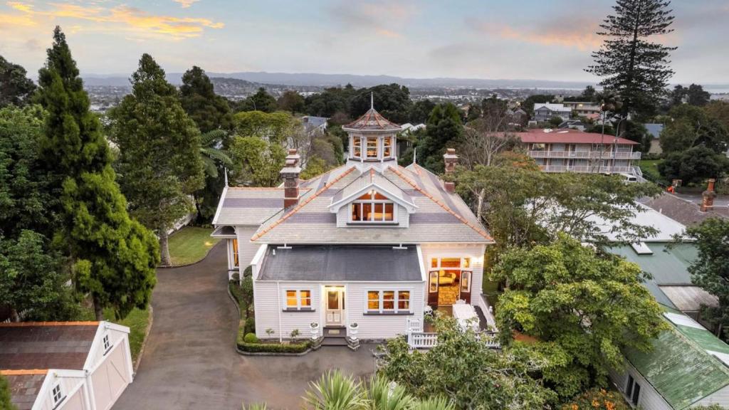 an aerial view of a white house with a turret at Mt Eden Victorian Villa in Auckland