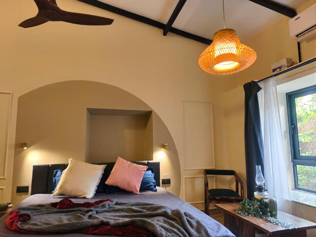 Giường trong phòng chung tại Casa Century