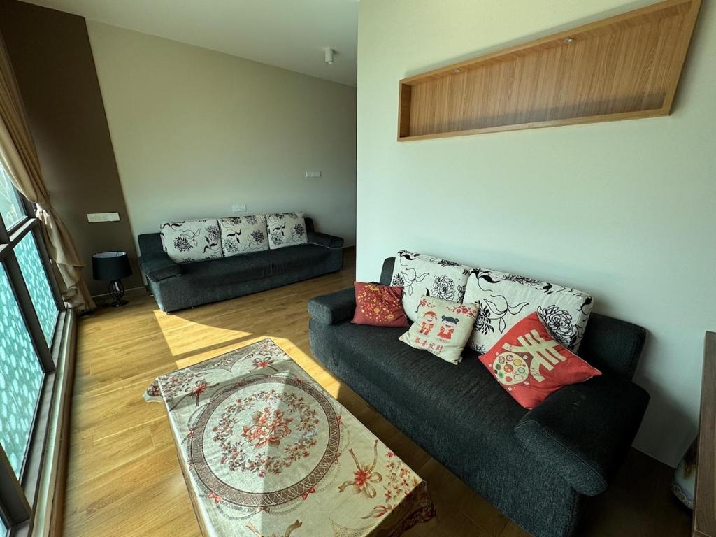 Χώρος καθιστικού στο Make Memories Cozy 2BR Family Suite Summer Mall