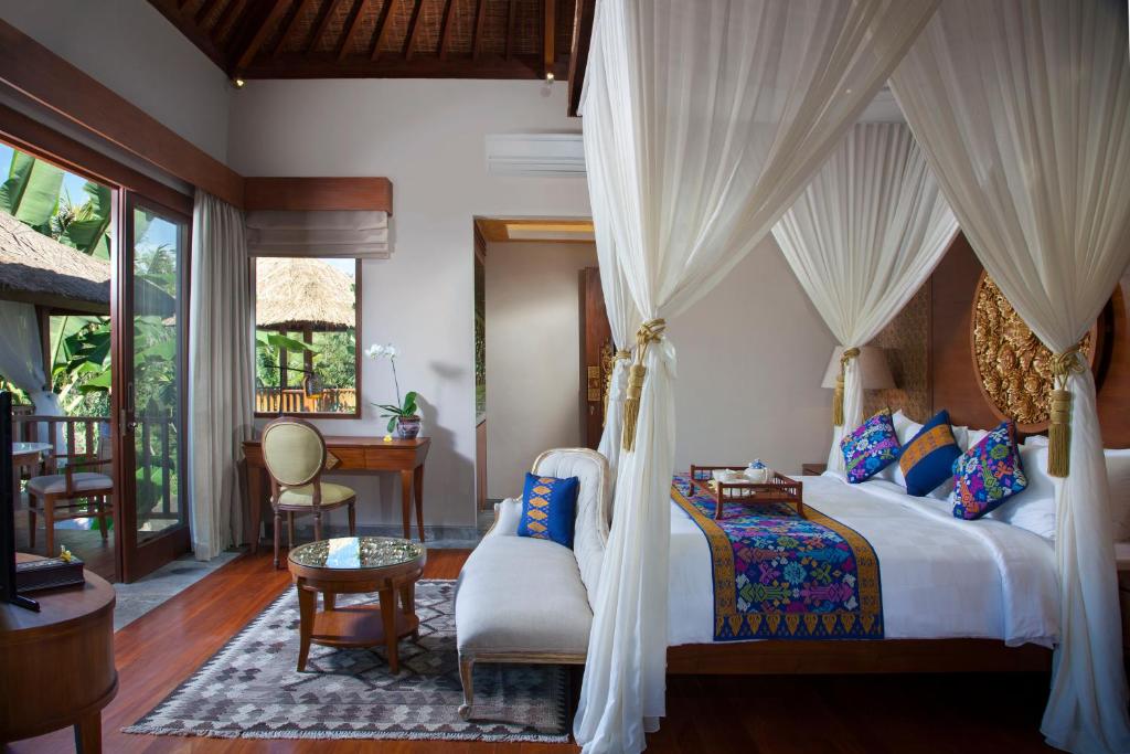 Postel nebo postele na pokoji v ubytování Natya Resort Ubud