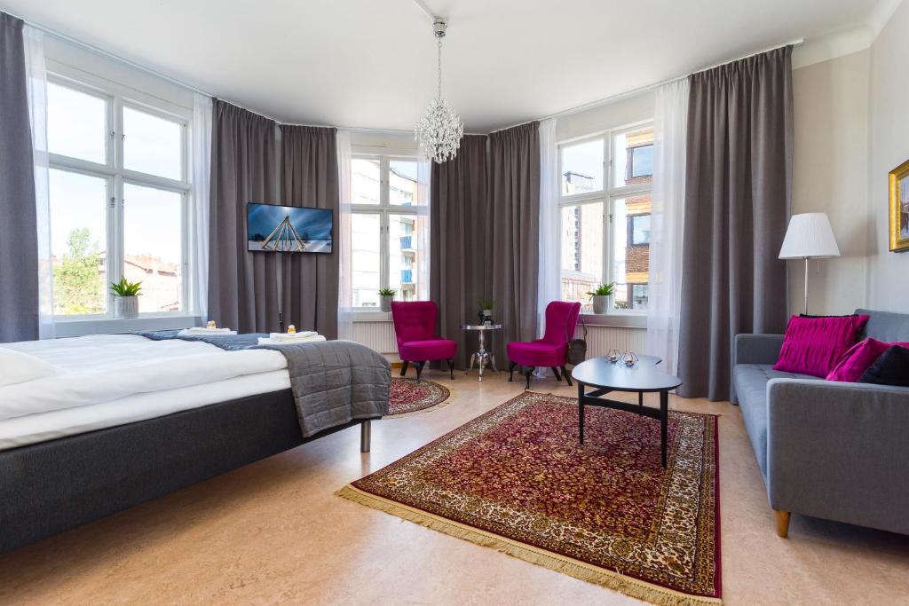 Postel nebo postele na pokoji v ubytování Hotell Drottninggatan 11
