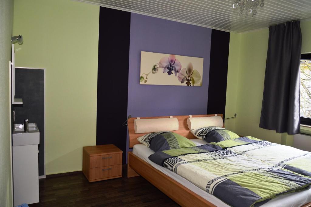 Postel nebo postele na pokoji v ubytování Eifelhaus4you