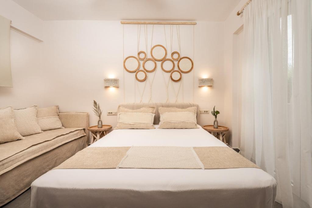 Ένα ή περισσότερα κρεβάτια σε δωμάτιο στο Spiros Family Apts