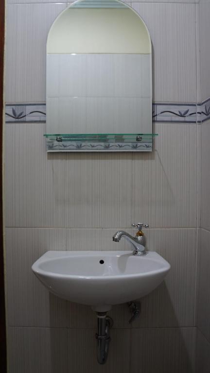 Koupelna v ubytování Utari House