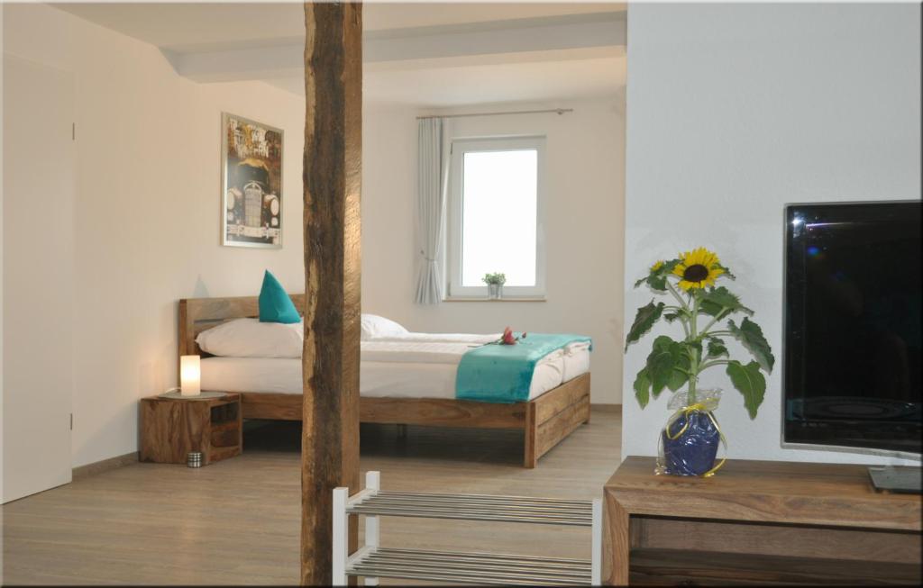 Ένα ή περισσότερα κρεβάτια σε δωμάτιο στο Moserhof-Apartments