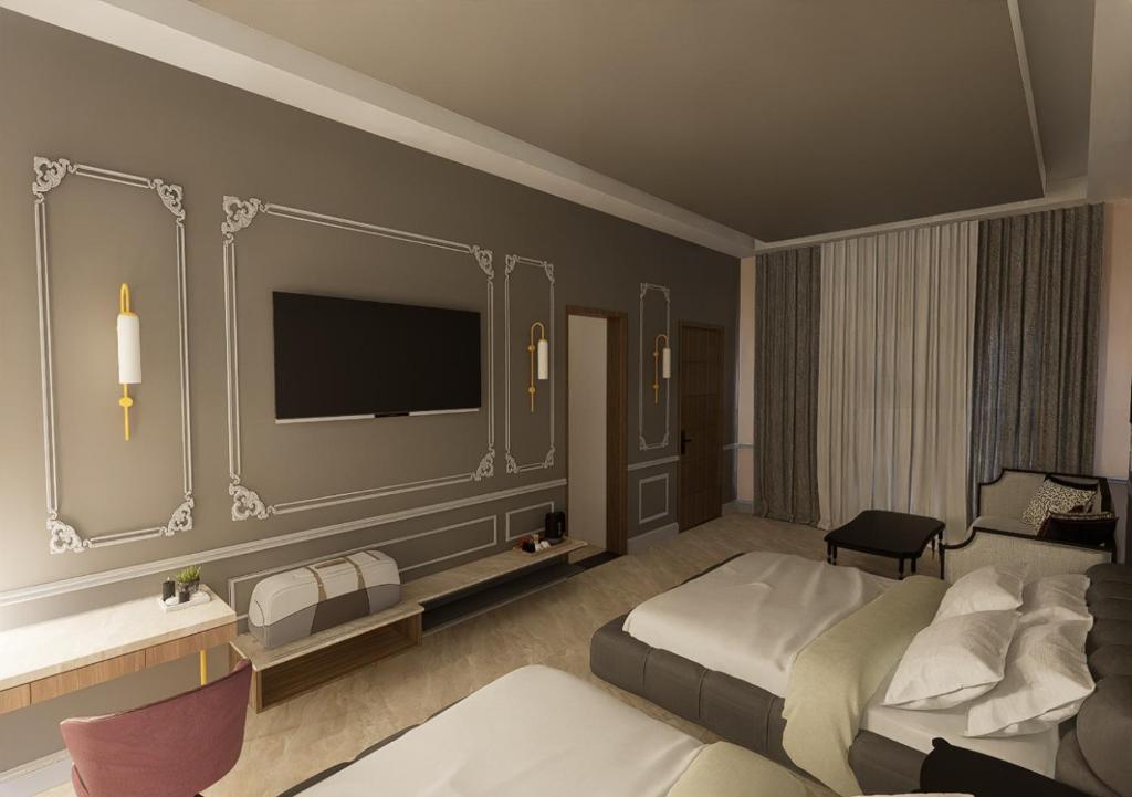 Кровать или кровати в номере Dusk and Dawn Beach Resort