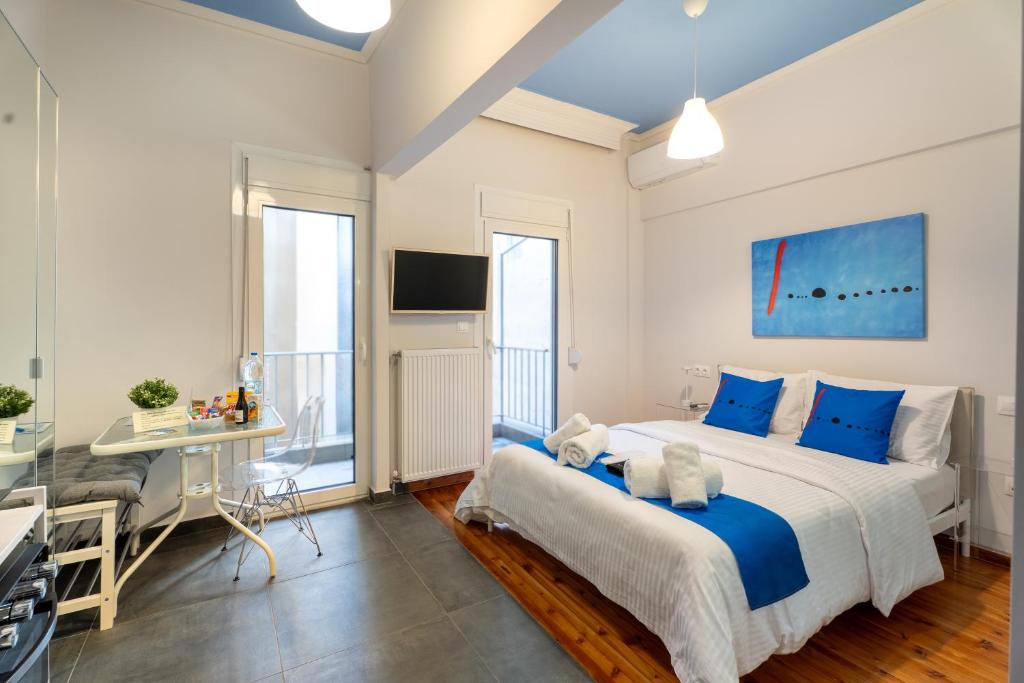 Rúm í herbergi á Hippodrome Cute - Blue