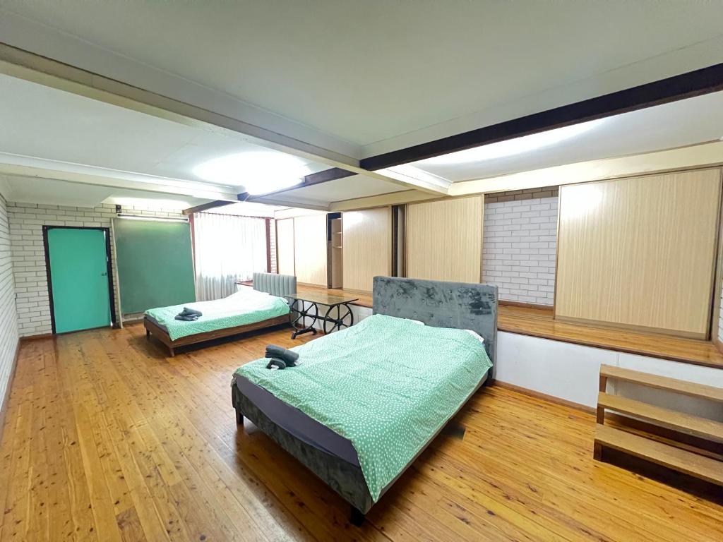 Ένα ή περισσότερα κρεβάτια σε δωμάτιο στο Room 72