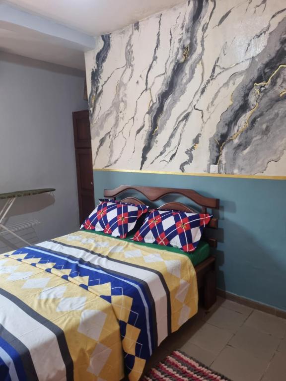 Postel nebo postele na pokoji v ubytování VIP stay in Yaoundé