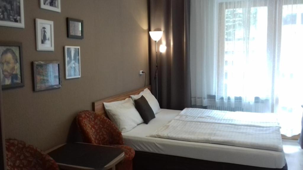 En eller flere senge i et værelse på BLISKO DEPTAKA - Apartamenty i Pokoje