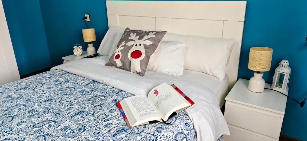 Ένα ή περισσότερα κρεβάτια σε δωμάτιο στο Piso amplio y luminoso, La Pomar