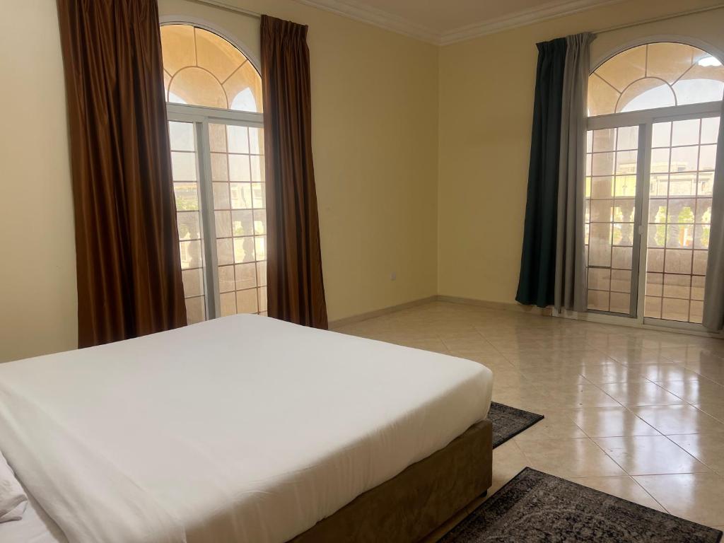 Ένα ή περισσότερα κρεβάτια σε δωμάτιο στο doge villa 4