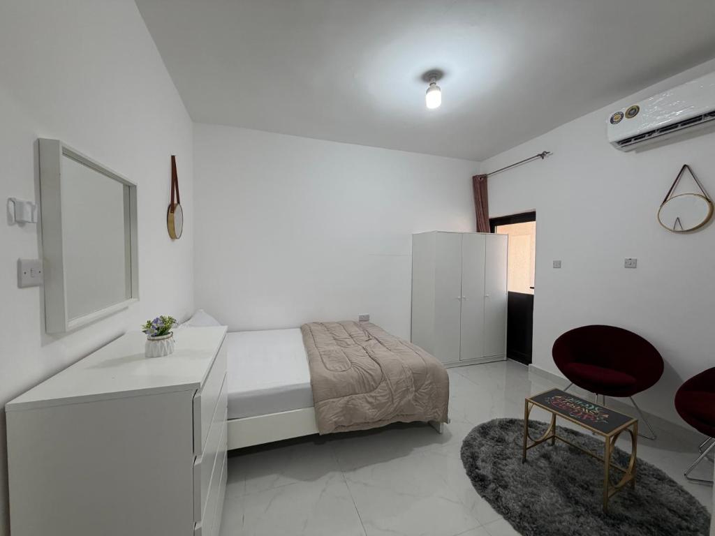 Ένα ή περισσότερα κρεβάτια σε δωμάτιο στο Khalidiya Studio