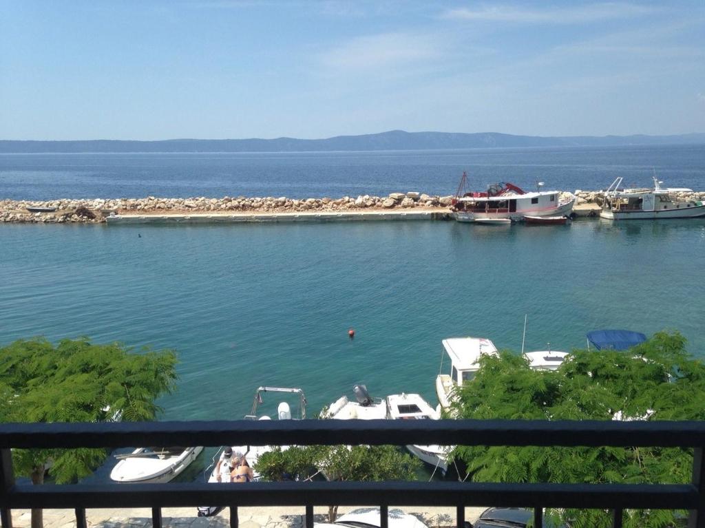 a view of a harbor with boats in the water at Apartment Milena in Drasnice