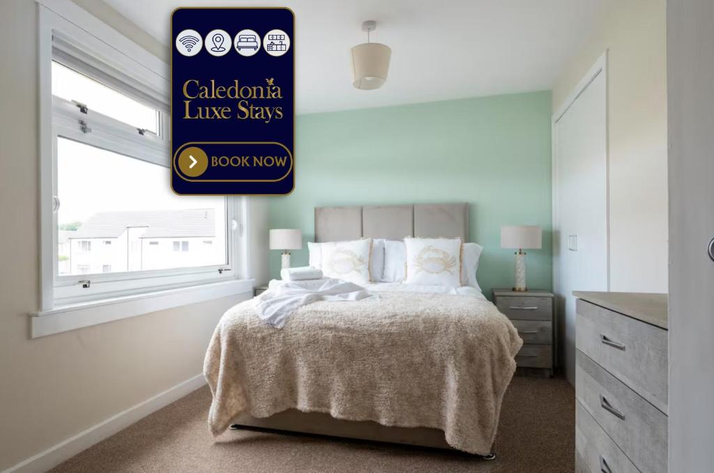 a bedroom with a bed and a sign that reads cattoria live stars at Tummel Place in Grangemouth