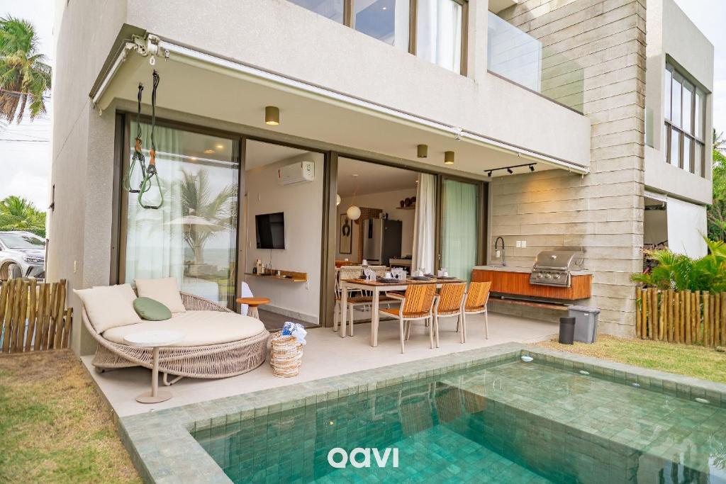 Barra do CamaragibeにあるCasa Duplex à Beira-mar OKA Milagres by Qaviの隣の家