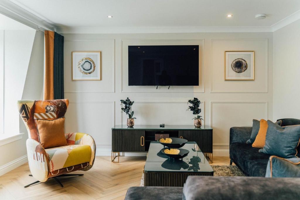 Μια τηλεόραση ή/και κέντρο ψυχαγωγίας στο Eagleside Apartments