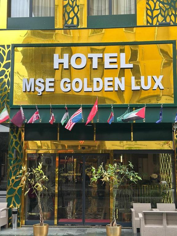 a hotel msg golden lux sign on a building at Golden Lux Hotel Antalya in Antalya