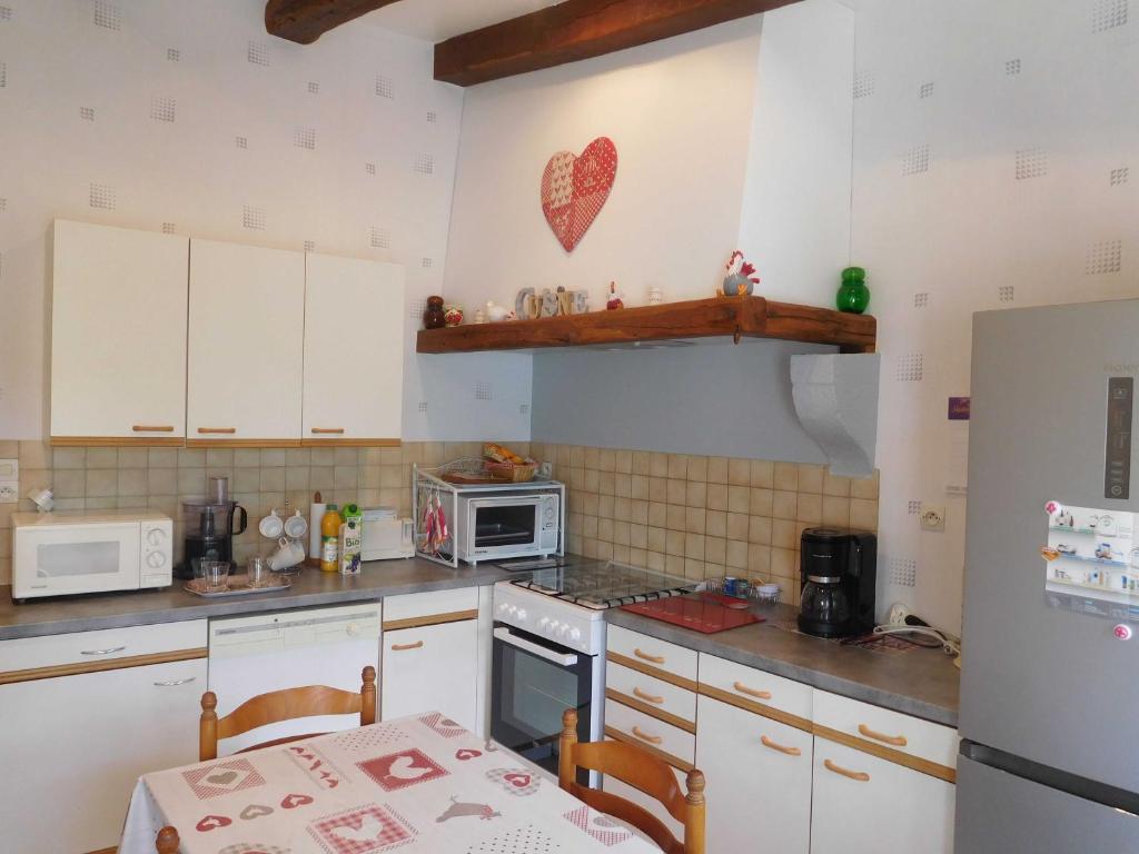 Kuchyň nebo kuchyňský kout v ubytování Le pastoral