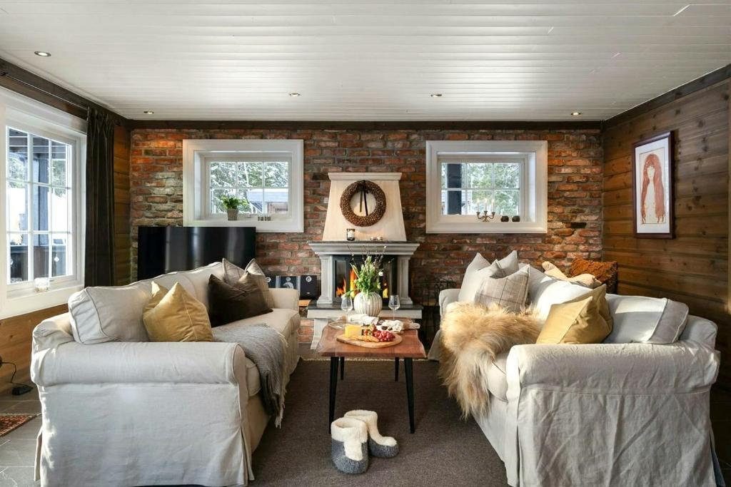 Posezení v ubytování Family Cabin With Shelter By Lake Gautetjern