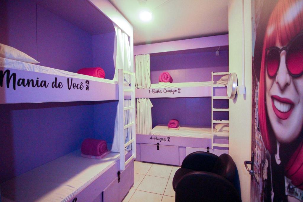 Ένα ή περισσότερα κρεβάτια σε δωμάτιο στο Kasa Hostel Karaokê