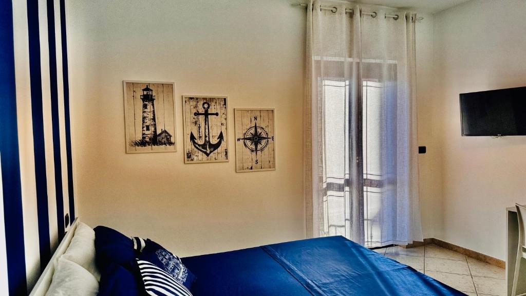 Телевизор и/или развлекательный центр в BEB Satriani Room