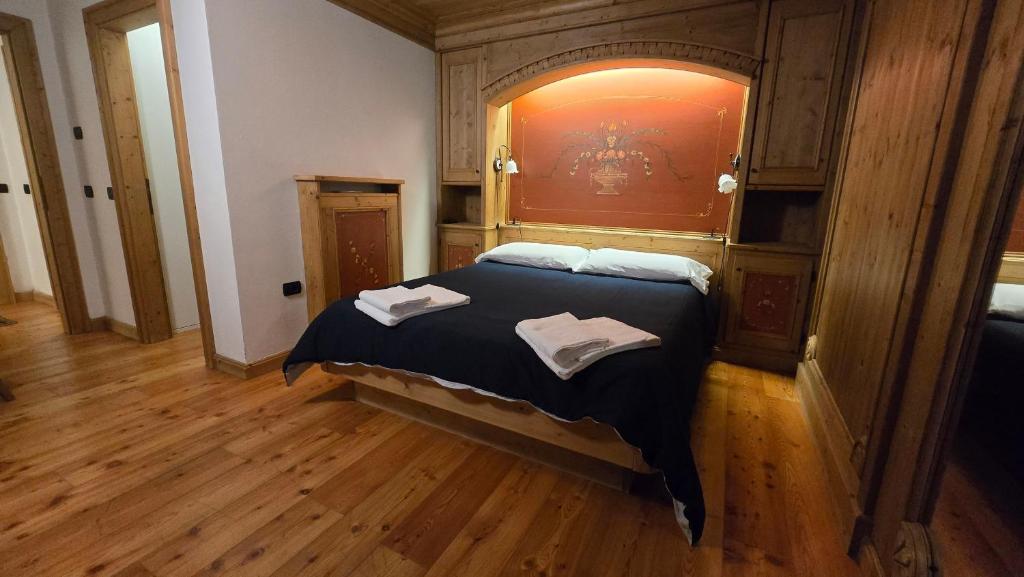 Ένα ή περισσότερα κρεβάτια σε δωμάτιο στο Excelsior