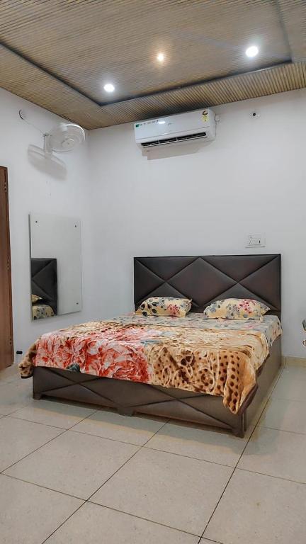 Postel nebo postele na pokoji v ubytování Hotel Apple