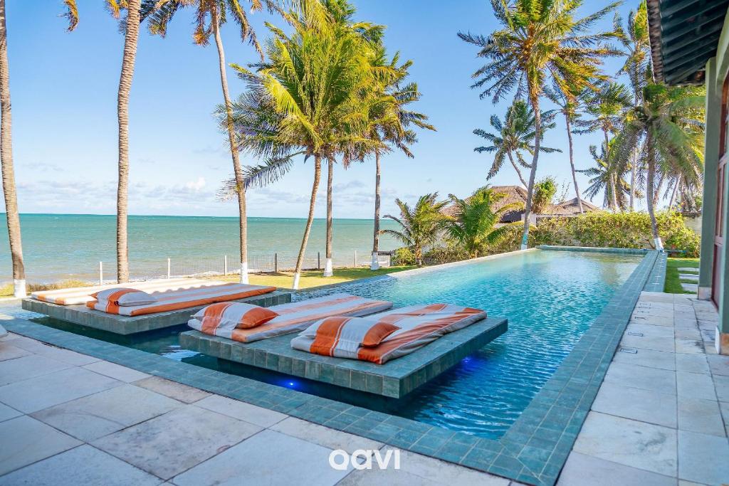 Πισίνα στο ή κοντά στο Casa Beira-Mar com Piscina em Jacumã by Qavi