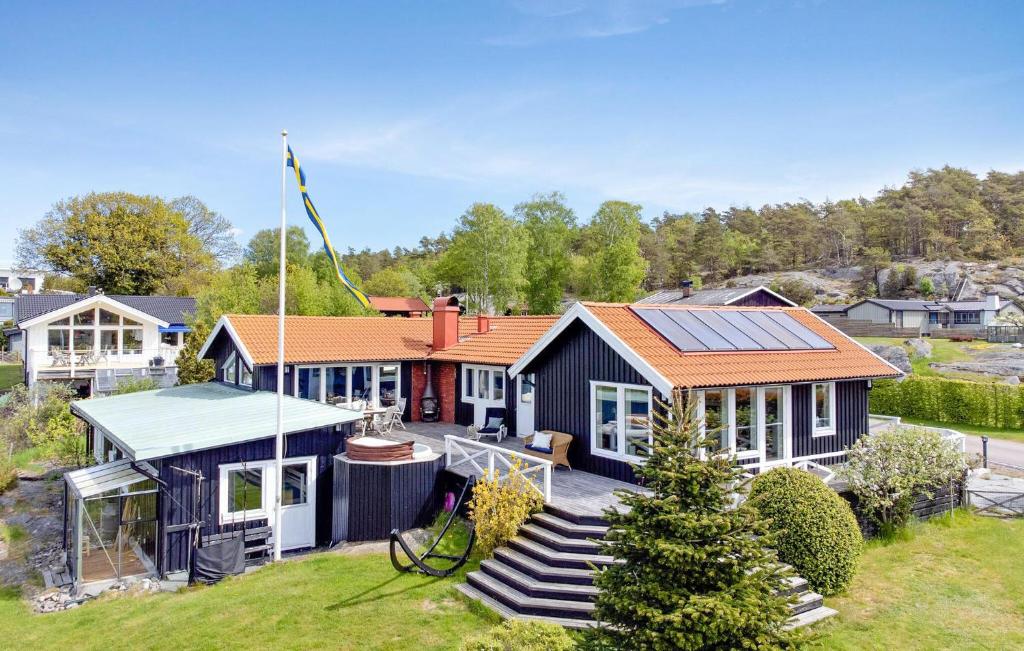 an image of a house with solar panels on it at 5 Bedroom Cozy Home In Onsala in Draget