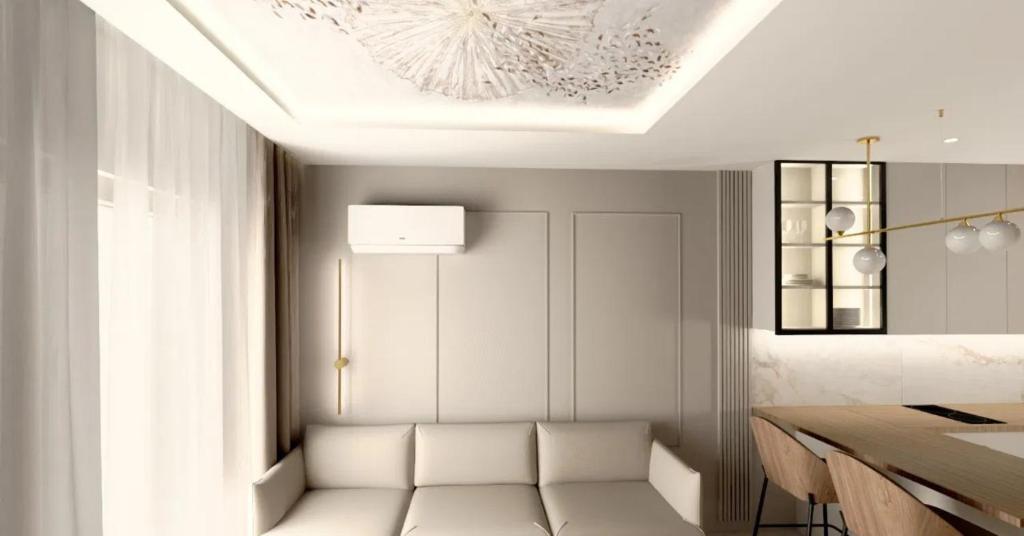 a dining room with a table and a ceiling at Apartament pod Krasnalem in Wrocław