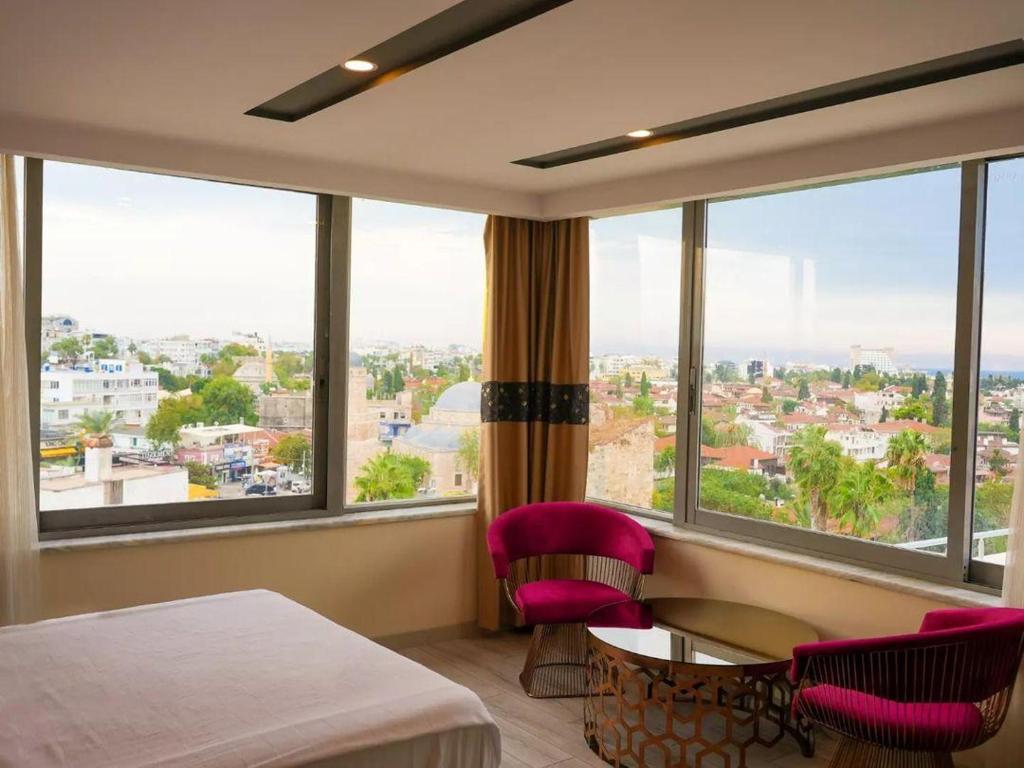 Ένα ή περισσότερα κρεβάτια σε δωμάτιο στο Golden Lux Hotel Antalya