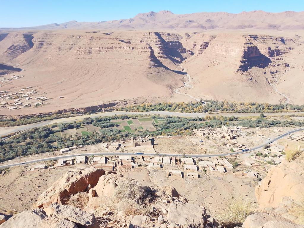 an aerial view of a road in the desert at Gîte Palma Eagle Ziz Canyon in Er Rachidia