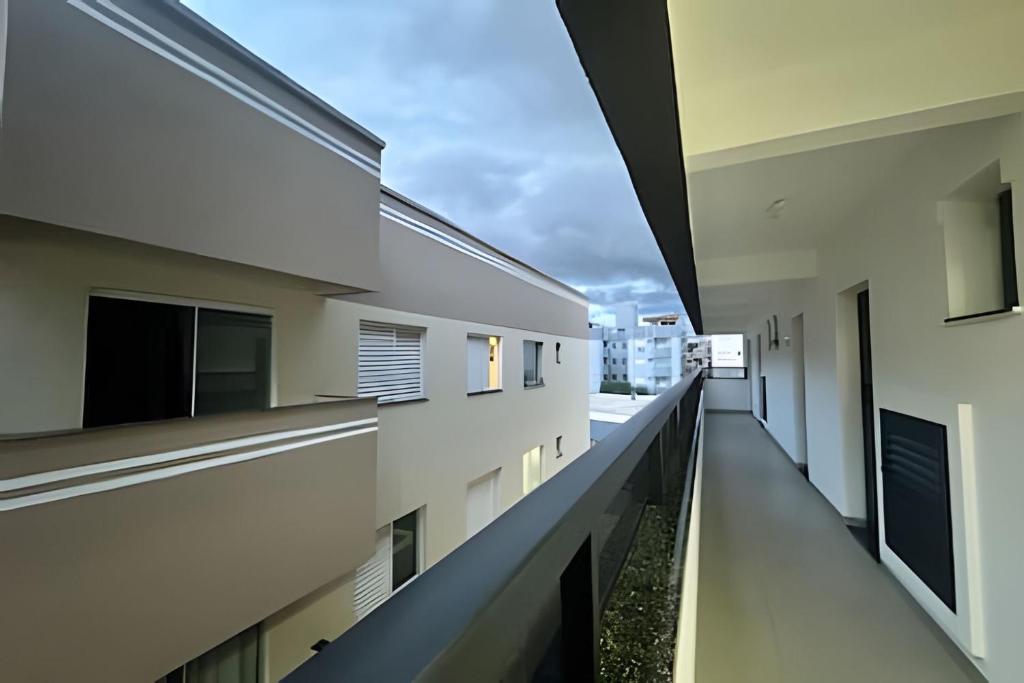 a view from the balcony of an apartment building at Studio Pérola – Conforto, modernidade prox a UFU! in Uberlândia