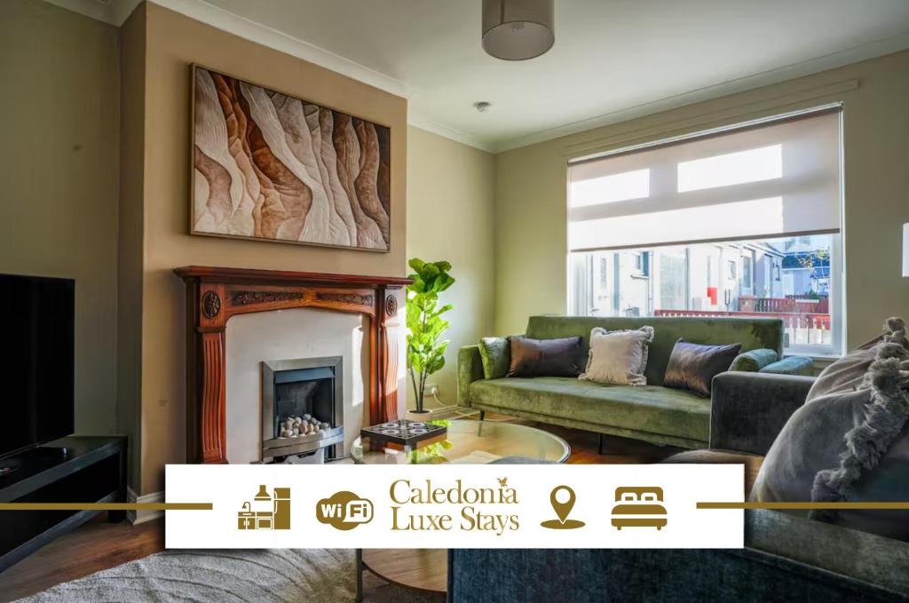 een woonkamer met een bank en een open haard bij 4 BDR House At Caledonia Luxe Stays Short Lets & Serviced Accommodation Bo'ness in Boʼness