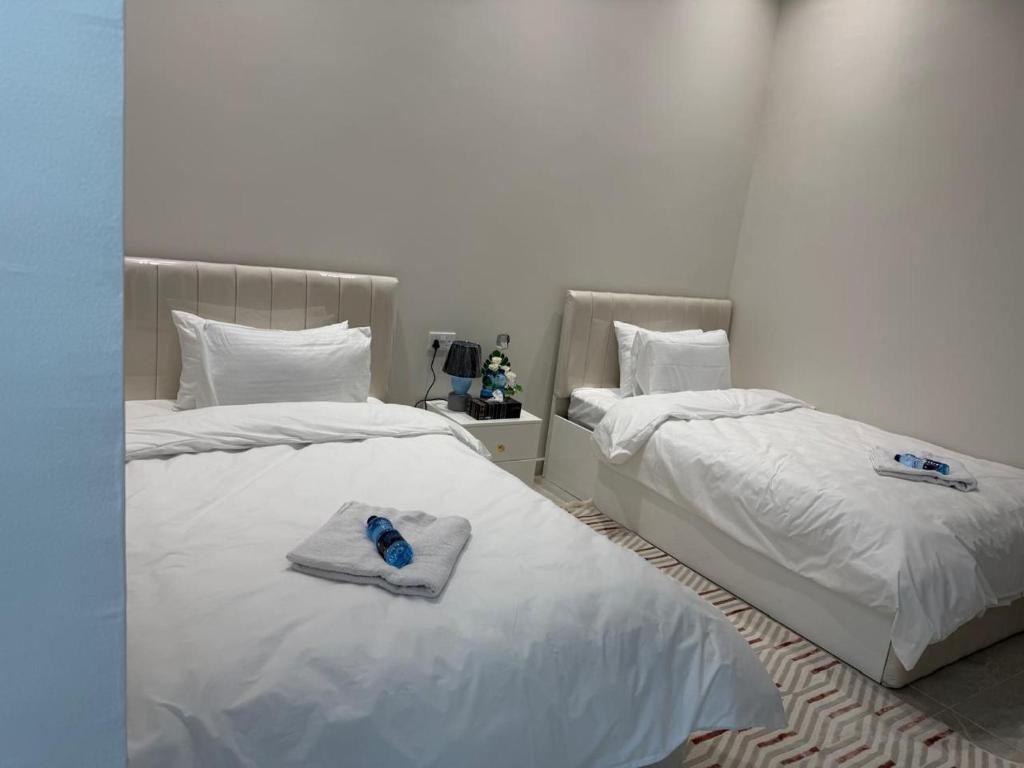 Cama o camas de una habitación en فلة الشروق - Sunrise Villa