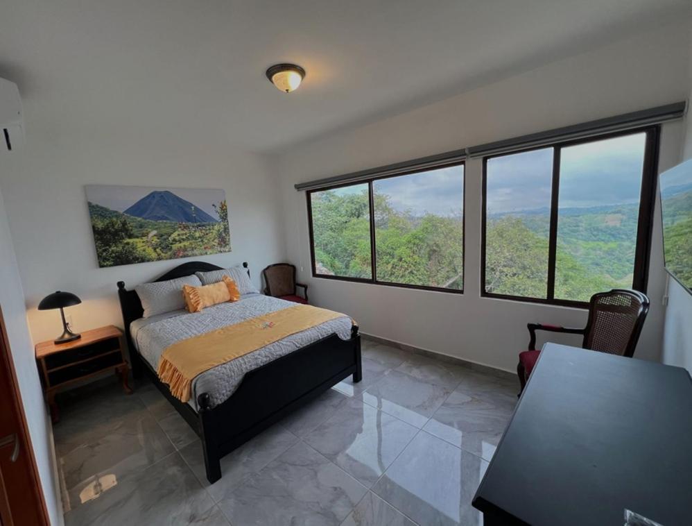 Postel nebo postele na pokoji v ubytování Hotel Vista Hermosa Suchitoto