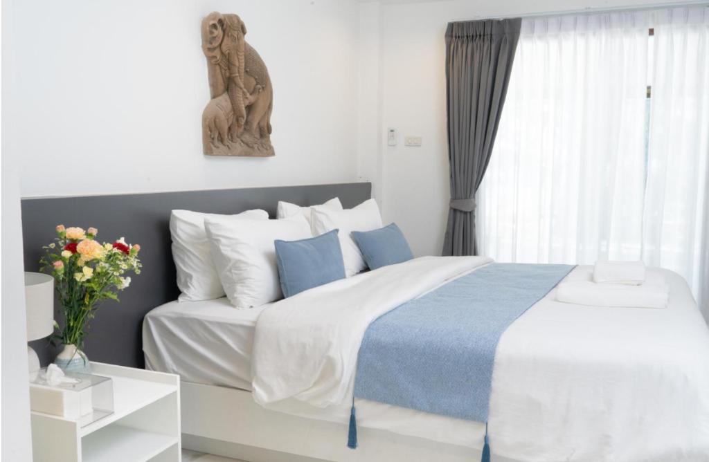 Ένα ή περισσότερα κρεβάτια σε δωμάτιο στο Brickotel Naithon Beach