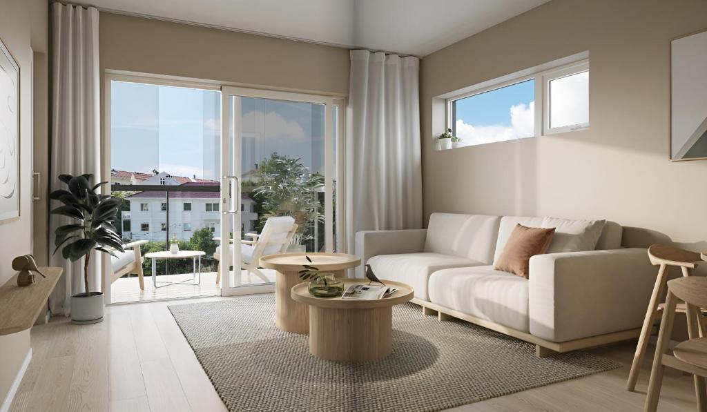 Et opholdsområde på Modern apartment by the sea