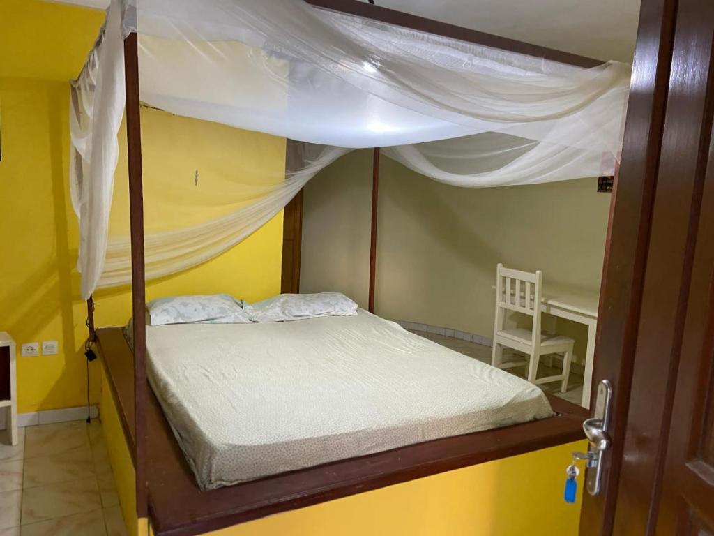 Ένα ή περισσότερα κρεβάτια σε δωμάτιο στο Kernico