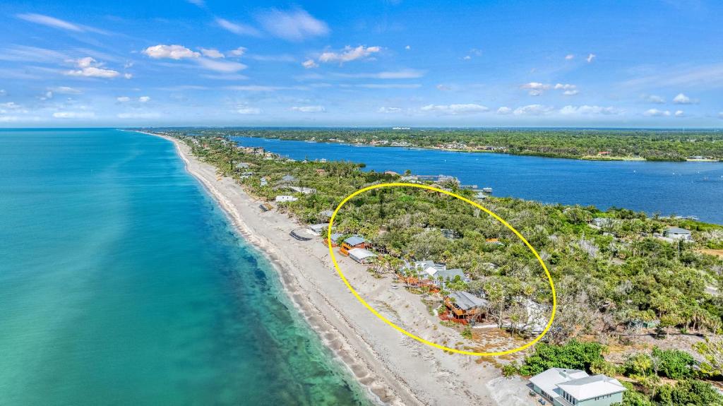 an aerial view of an island with a yellow circle at Oak Grove Escape with Shared Deck & Direct Beach Access in Englewood