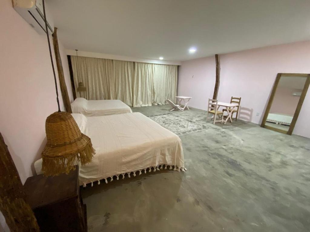 Postel nebo postele na pokoji v ubytování Cabañas y Restaurante La Luna