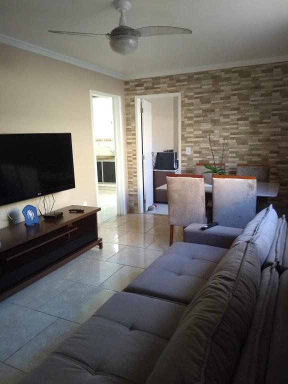 Khu vực ghế ngồi tại Casa 03 quartos no Centro de Rio das Ostras