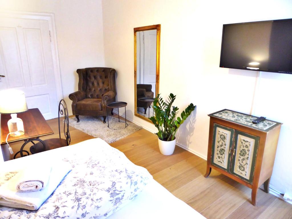 TV a/nebo společenská místnost v ubytování Art Hotel & Hostel