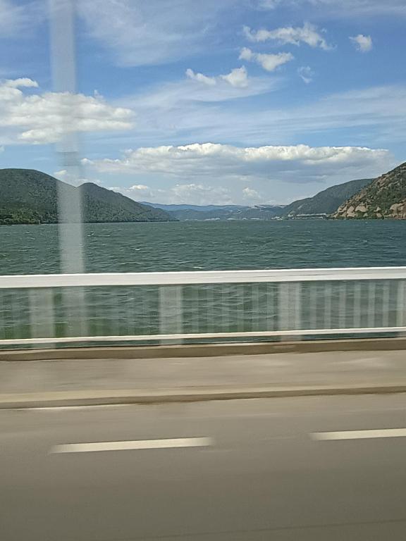 a view of the water from a train window at l apartment in Craiova