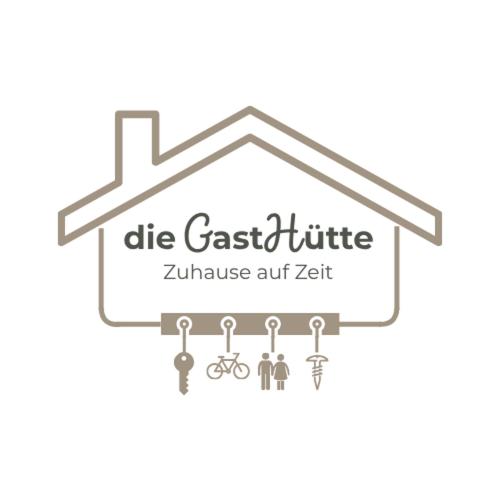 a set of keys hanging from a roof logo at die GastHütte in Eisenhüttenstadt