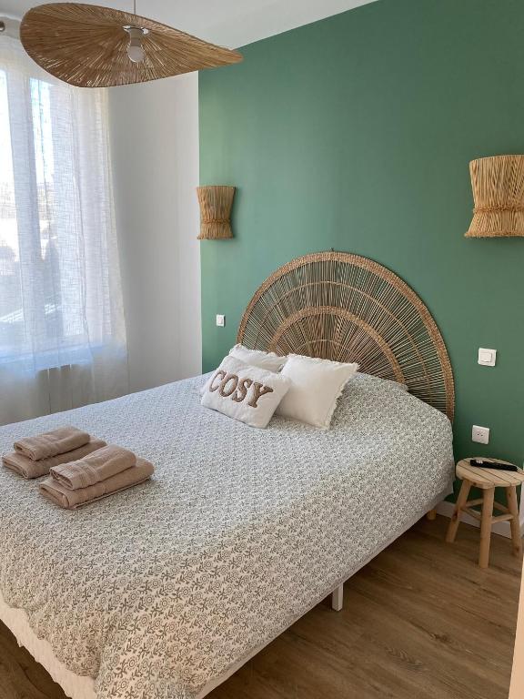 En eller flere senge i et værelse på L'effet Mer