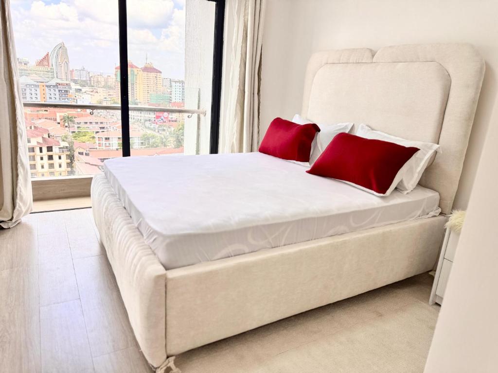 Ένα ή περισσότερα κρεβάτια σε δωμάτιο στο Pinecrest View Deluxe One-Bedroom