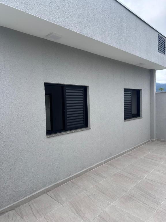 Φωτογραφία από το άλμπουμ του Casa com piscina em Peruíbe σε Peruibe