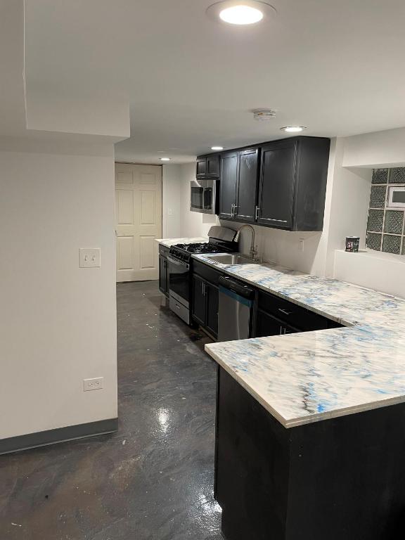 Η κουζίνα ή μικρή κουζίνα στο Grenshaw Guesthouse